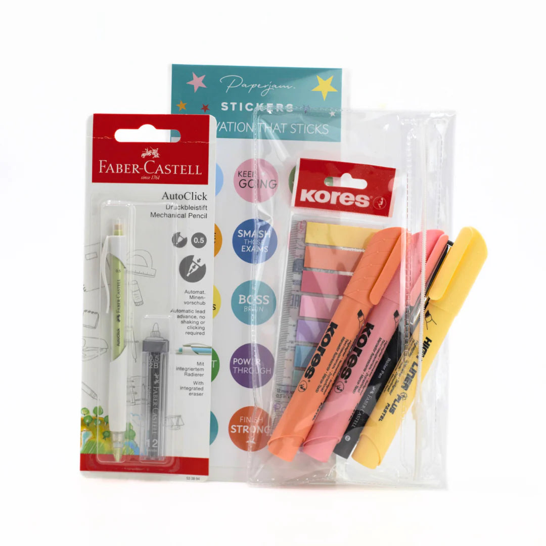 School Exam Stationery Kit Packaging of Faber-Castell and Kores stationery items including a mechanical pencil, stickers, and highlighters on a white background.