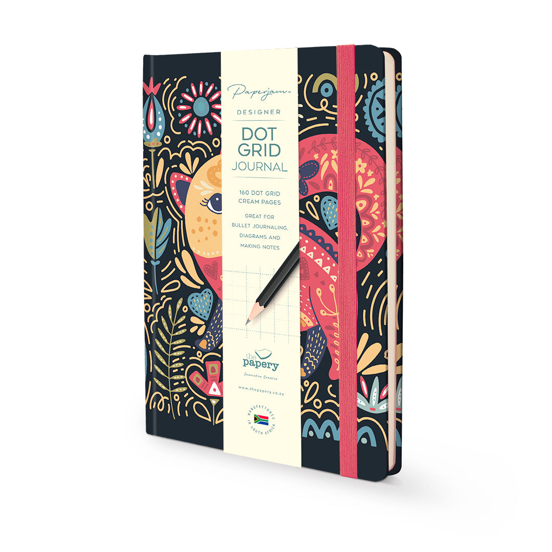 Papergoo Designer Blank Journal with a colorful, patterned cover featuring a central cream-colored band and a black pencil resting on it, set against a plain white background.