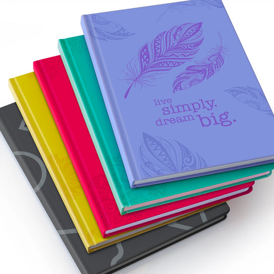 Stack of colorful Scribblz A5 Journal  with motivational quote on a white background