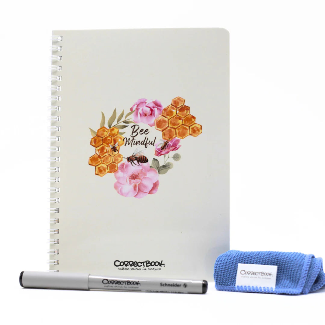 Bee Mindful CorrectBook (Write & Wipe) design, pen, and cloth on a white background