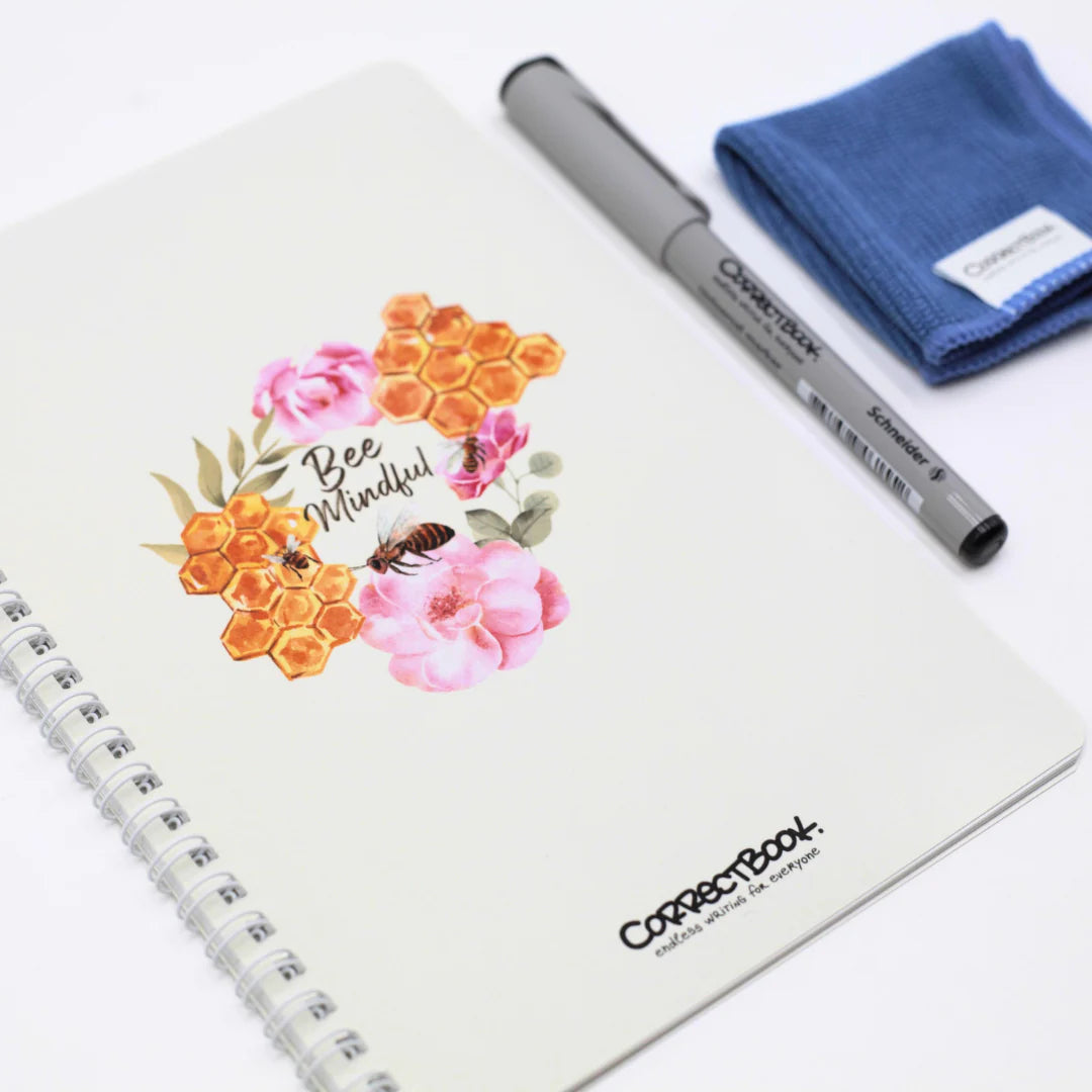 Bee Mindful CorrectBook (Write & Wipe) design and 'Bee Mindful' text, pen, and cloth on a white background