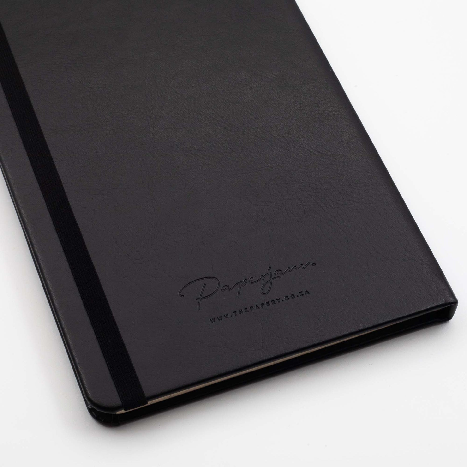 Back cover with 'Papajam' branding of the Classic Hardcover A5 Journal with a matching ribbon on a white background 
