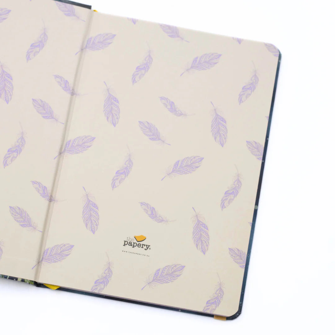 Journal with purple feather pattern and Papery logo on a white background