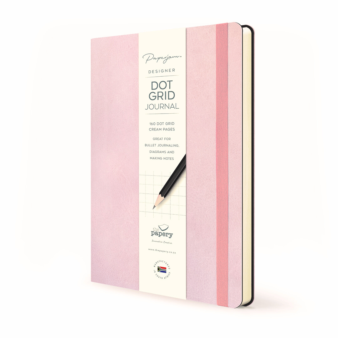 Dot Grid pages inside Soft cover flexi Journal with a candyfloss design on a white background