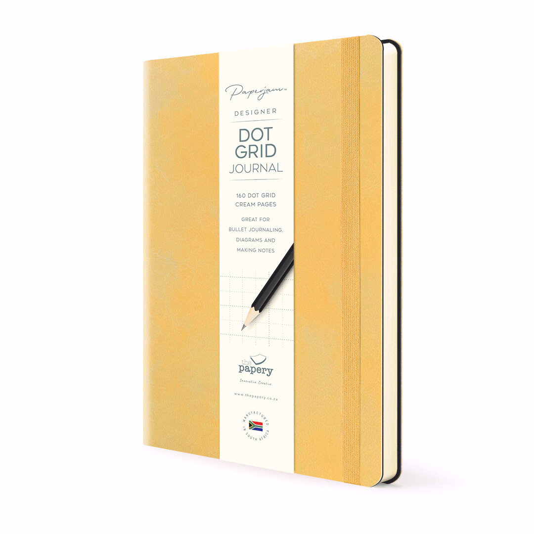 Dot Grid pages inside Soft cover flexi Journal with a clementine design on a white background