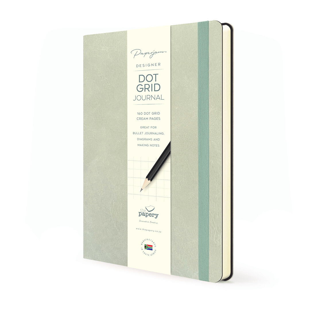 Dot Grid pages inside Soft cover flexi Journal with a truffle design on a white background