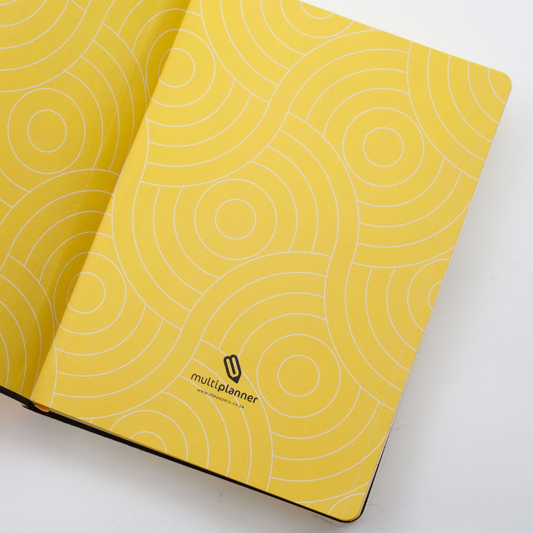 Flexi Multi-Planner in buttercup yellow end papers on a white background