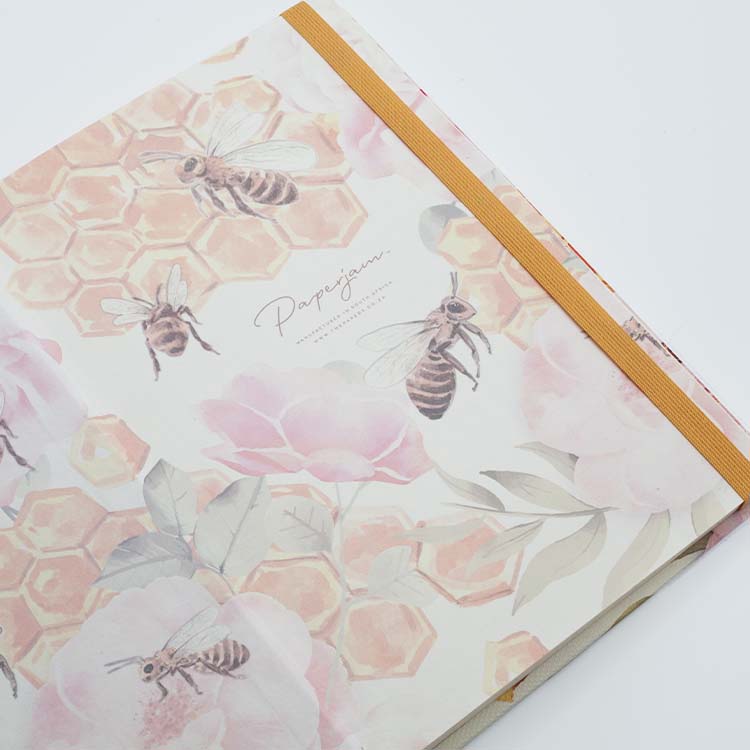 End papers of Insects Hard Cover Journal A5 with buzzing bees design and matching ribbon on a white background