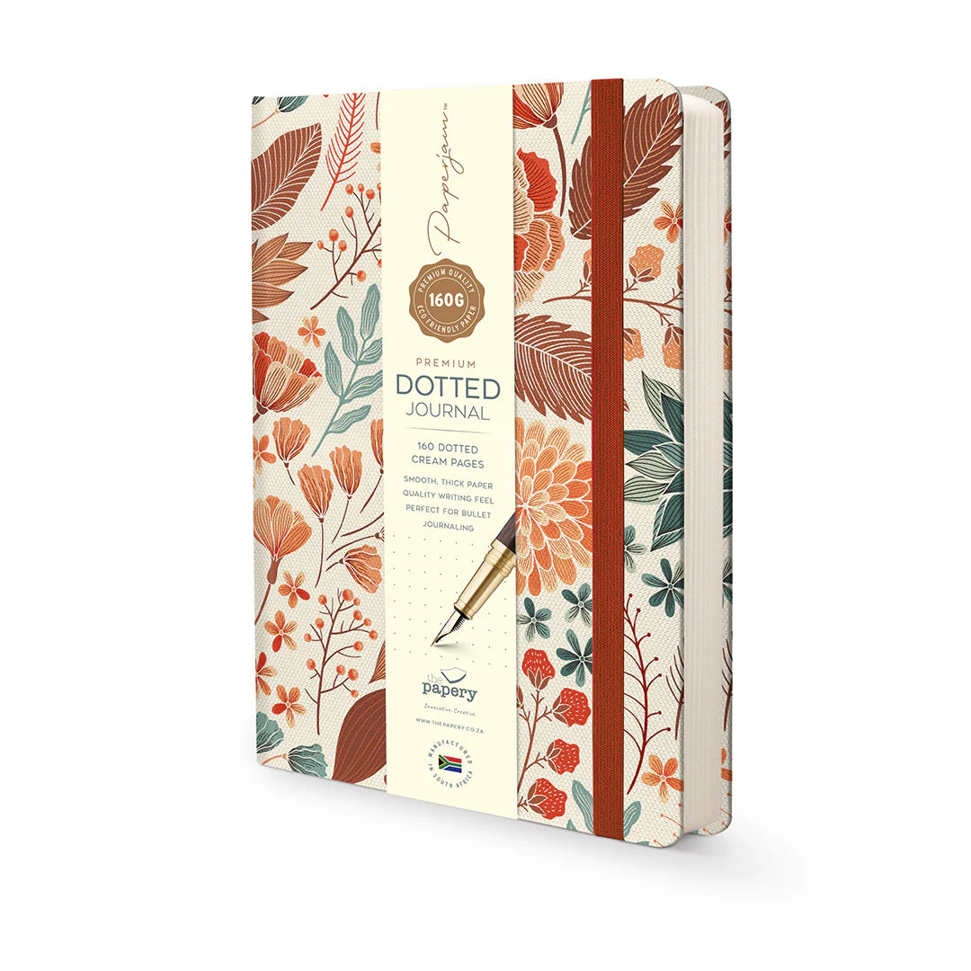Front cover of premium hardcover dotted journal with autumn floral design on a white background