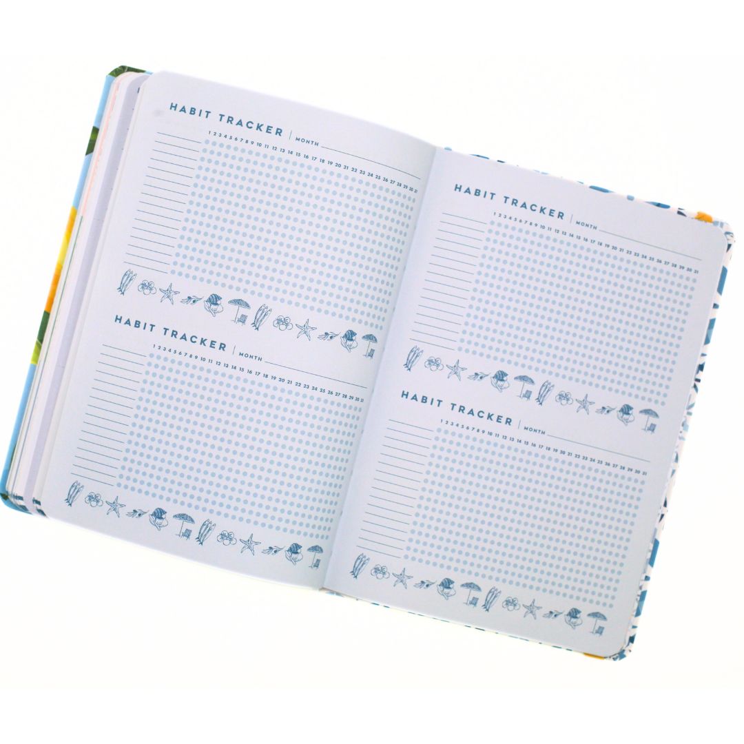 Open La Dolce Vita Life is beautiful guided vision Journal with habit tracker pages on a white background