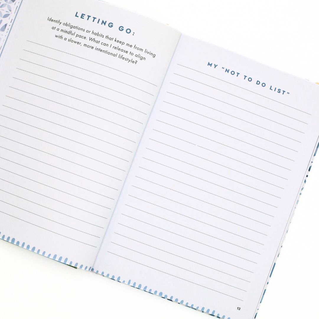Open La Dolce Vita Life is beautiful guided vision Journal with lined pages and 'Letting go' text prompts on a white background
