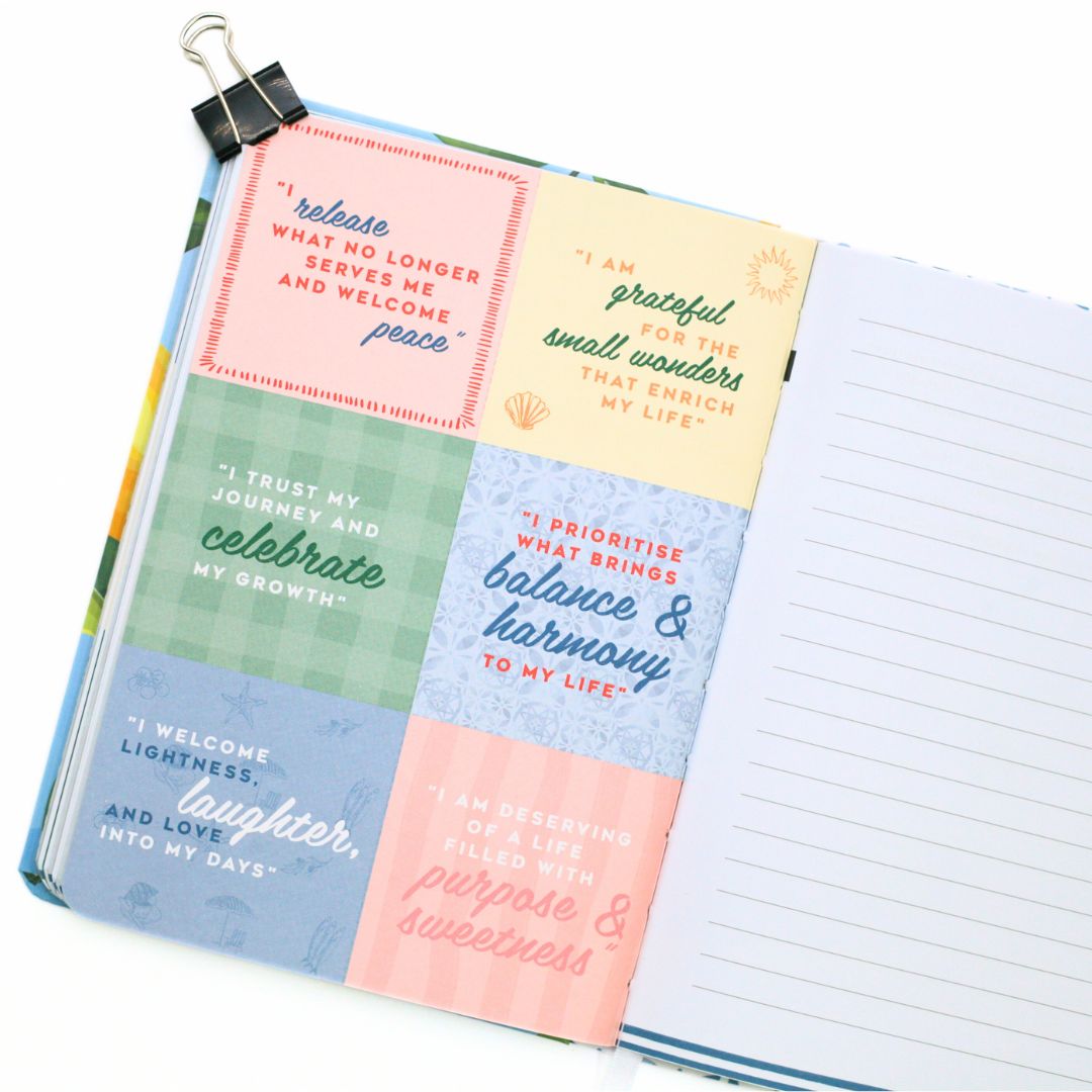 Open La Dolce Vita Life is beautiful guided vision Journal with perforated colorful affirmation cards on a white background
