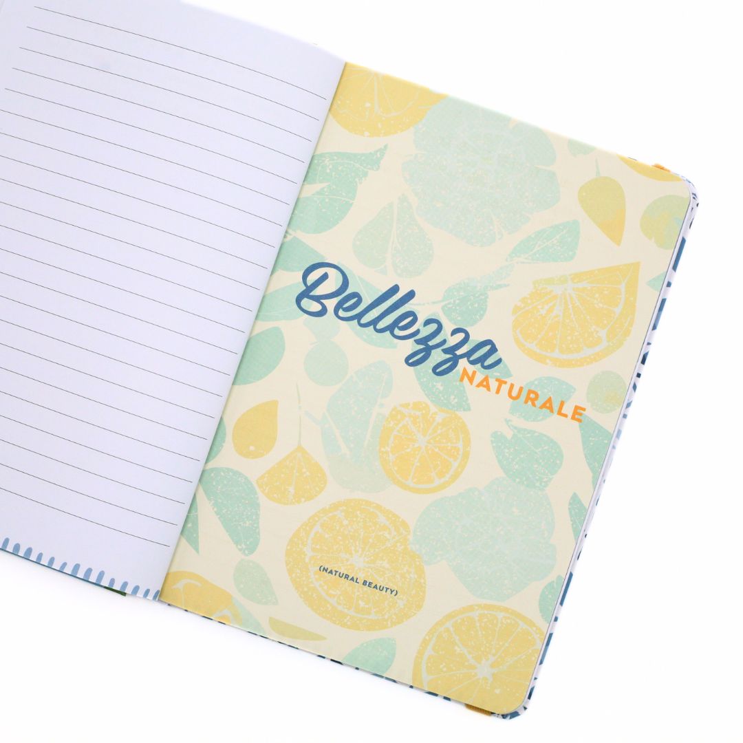 La Dolce Vita Life is beautiful guided vision Journal with lemon pattern and 'Bellezza Naturale' text with lined page on a white background