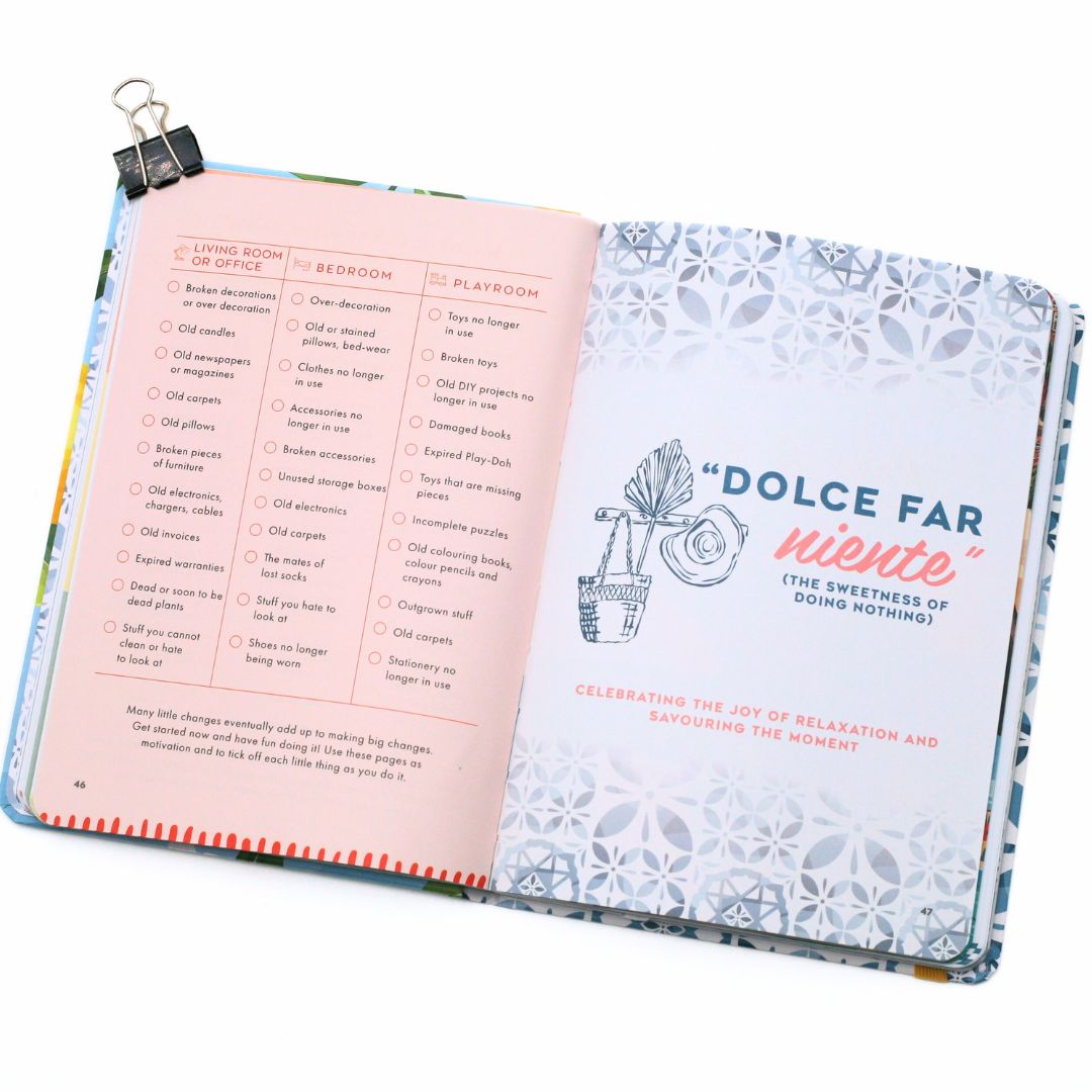 Open La Dolce Vita Life is beautiful guided vision Journal to a planner with pink and white pages on a white background