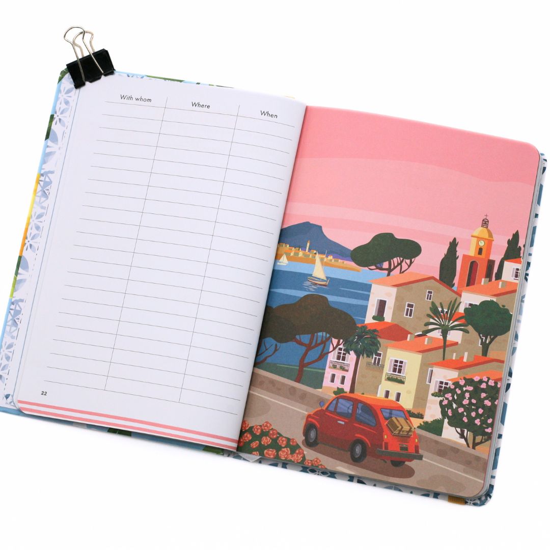 Open La Dolce Vita Life is beautiful guided vision Journal to a planner with scenic page and lined pages on a white background