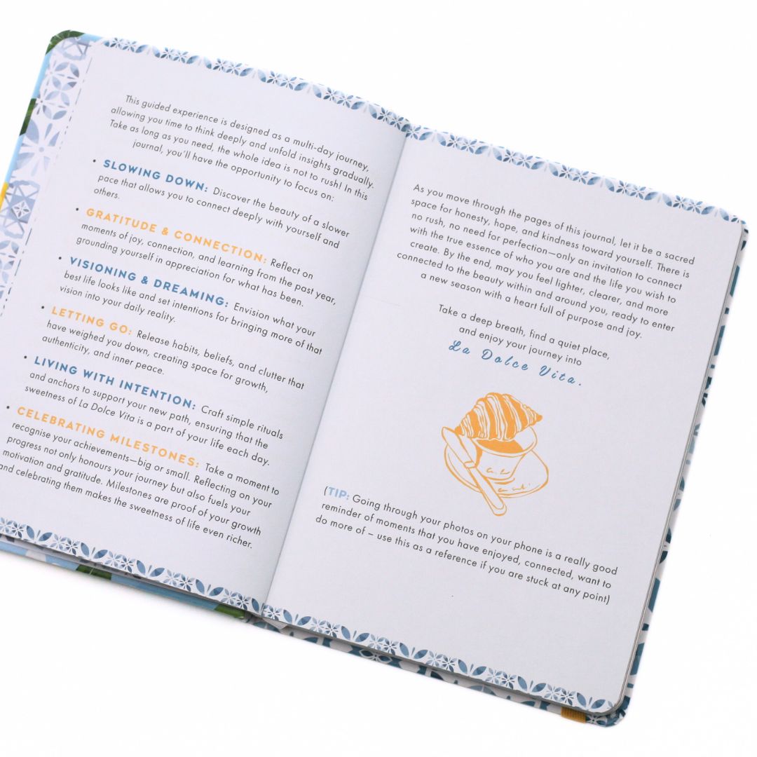 Open La Dolce Vita Life is beautiful guided vision Journal with text and illustrations on a white background