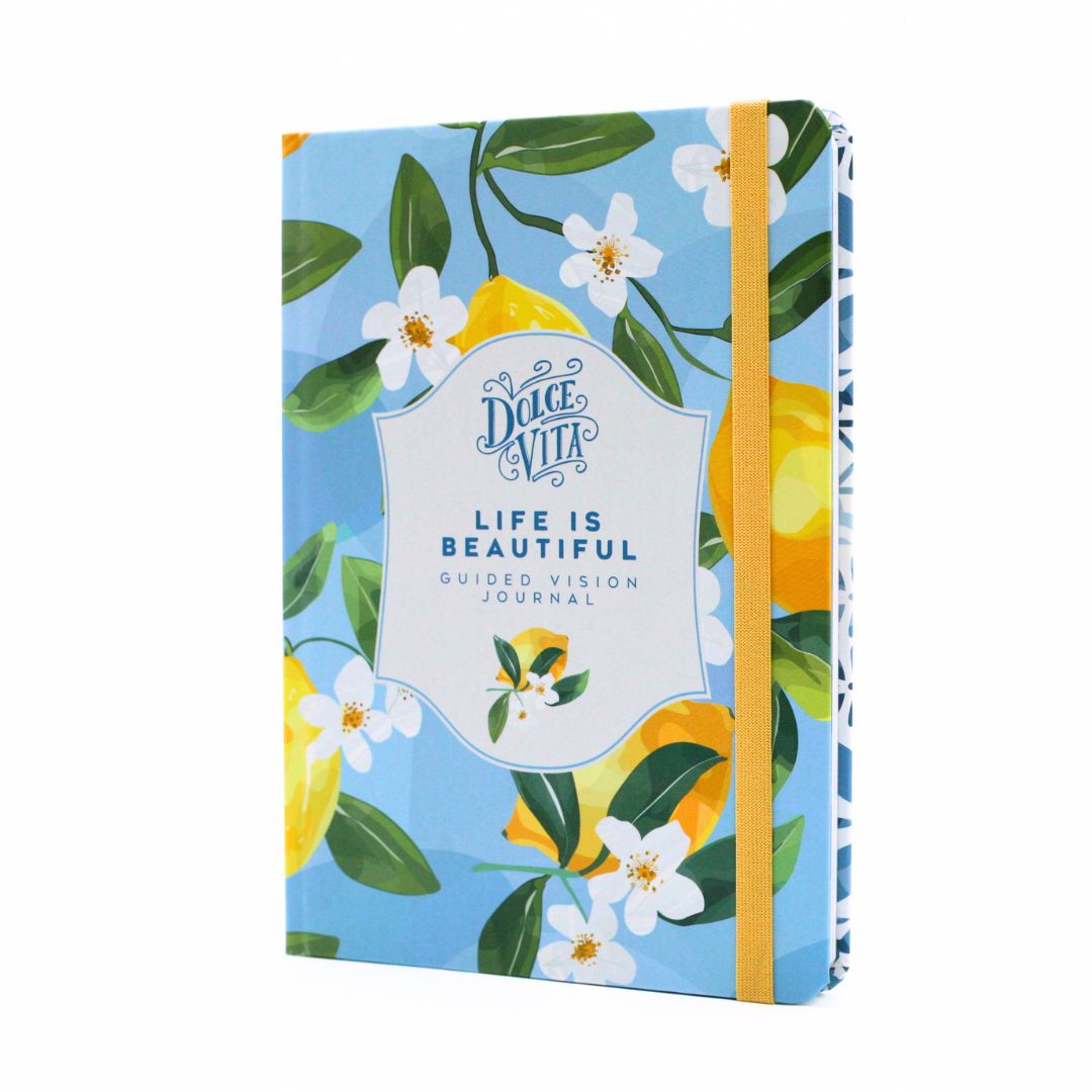 La Dolce Vita Life is beautiful guided vision Journal with lemon and flower design and matching ribbon on a blue background