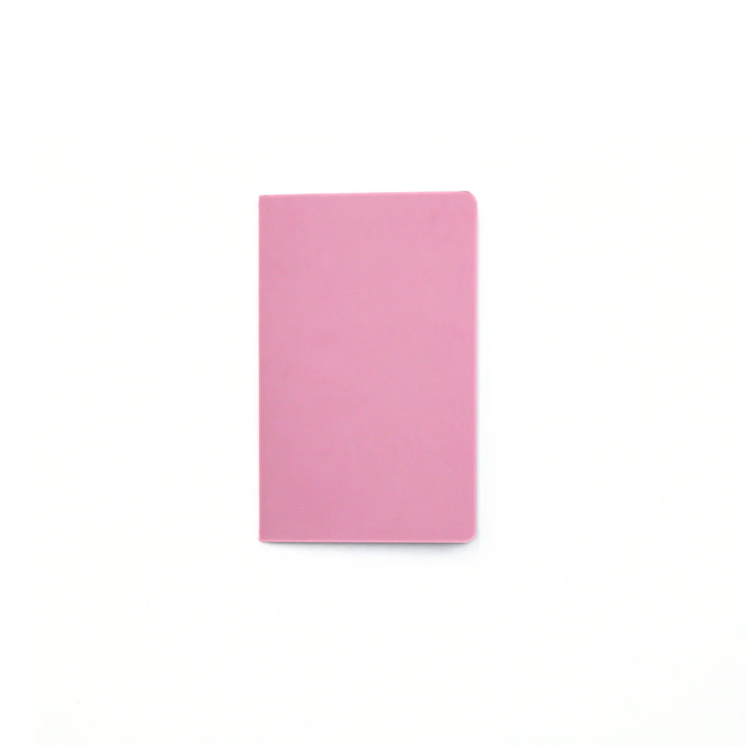 Pastel Pink Love and Macaron notebook on a white background