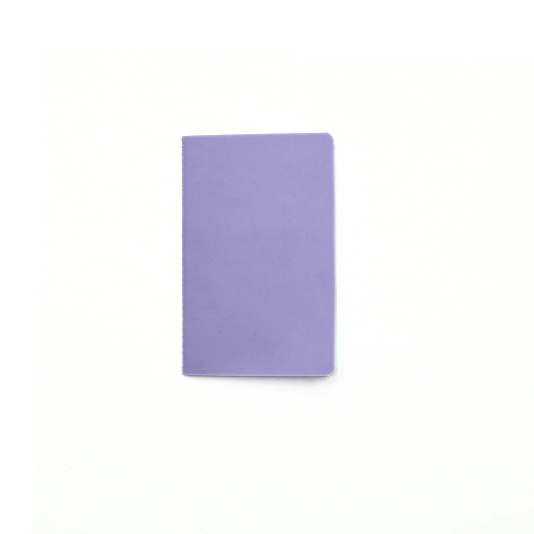 Pastel Purple Love and Macaron notebook on a white background