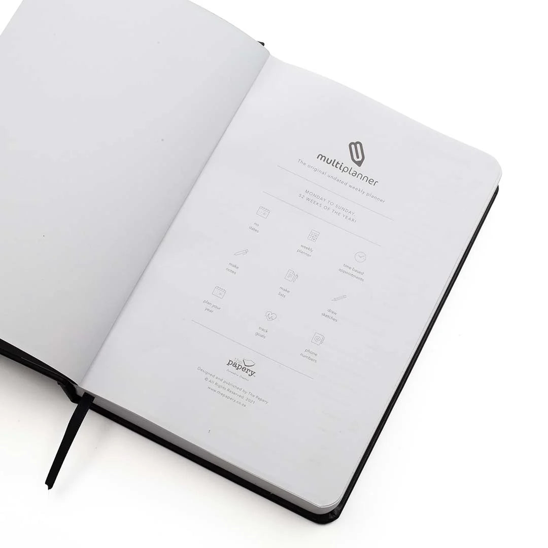 Open A5 multi planner with visible icons on a white background
