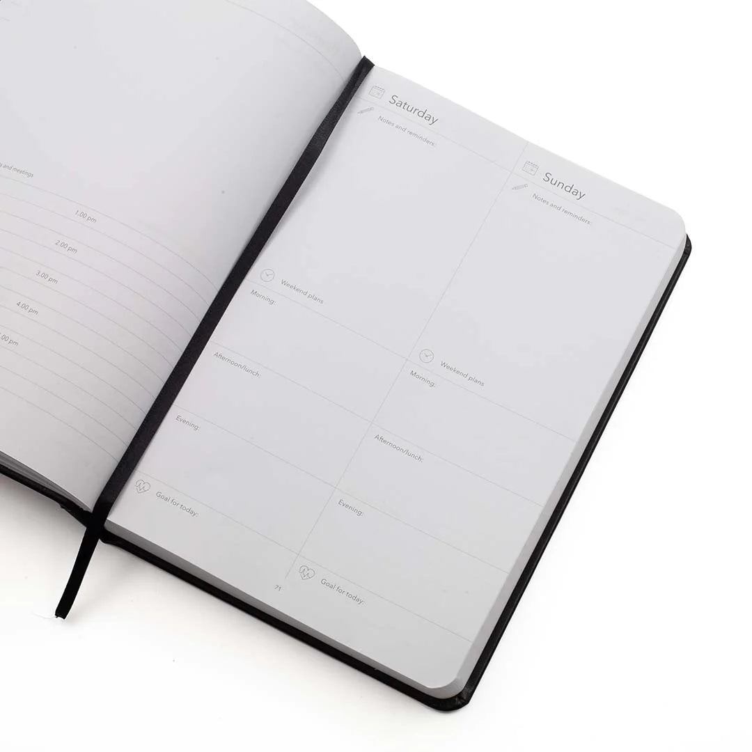 Open A5 multi planner with weekend page layout on a white background