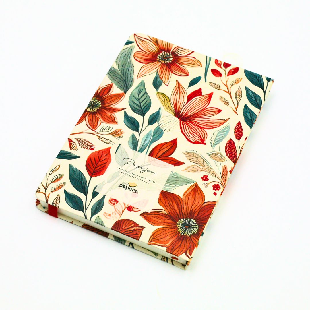 Back cover of premium hardcover dotted journal with autumn garden design on a white background