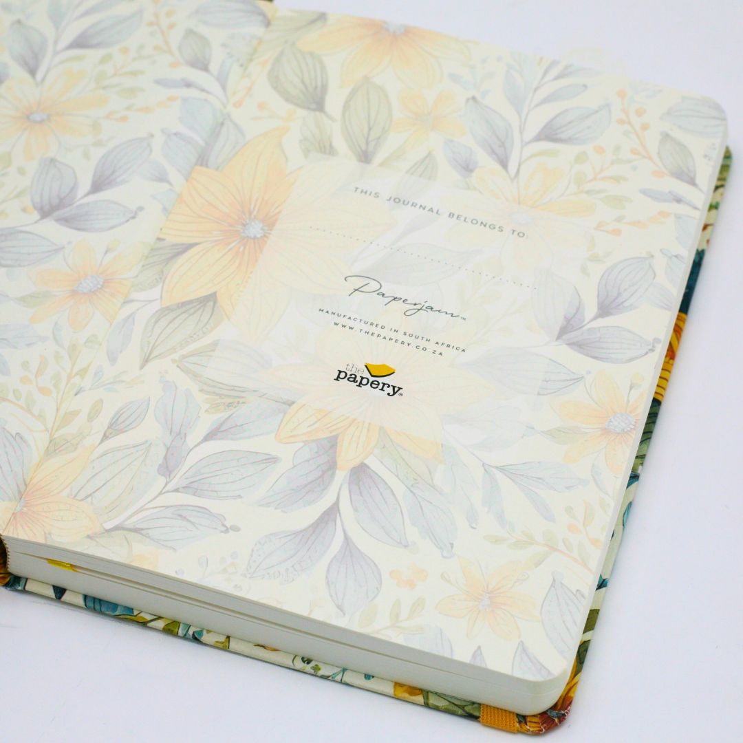 Personalization features of premium hardcover dotted journal with summer garden design on a white background