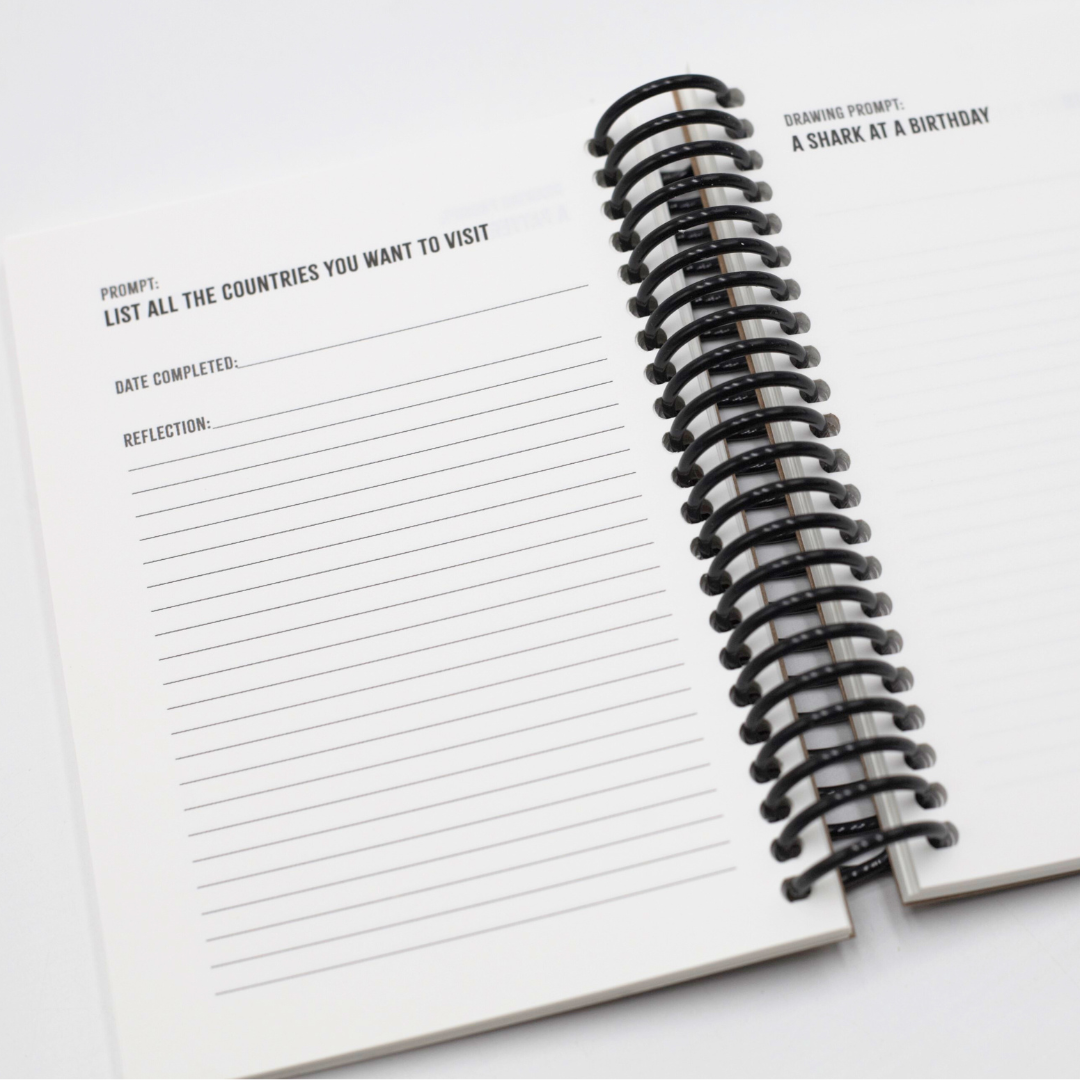 Open Digital Detox Reset Journal with spiral binding with interactive prompts on a white background