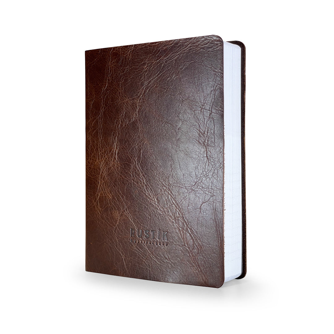A premium Rustik Flexi MultiPlanner in genuine leather with debossed logo in brown on a white background