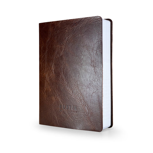 A premium Rustik Flexi MultiPlanner in genuine leather with debossed logo in brown on a white background