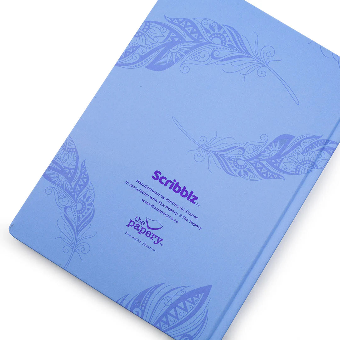 Back of Scribblz A5 hardcover Journal with lilac dream design and with motivational quote on a white background