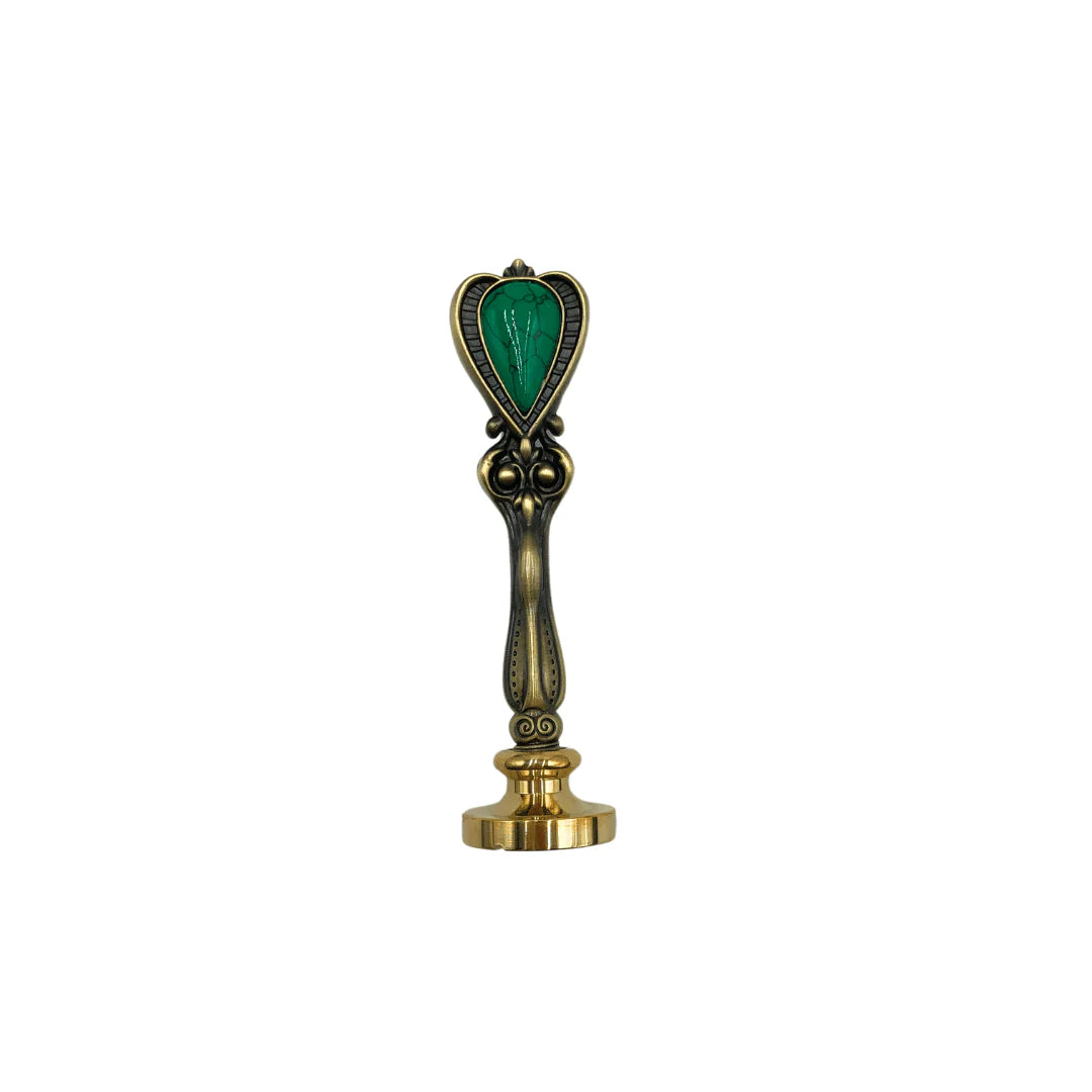 Sealing Wax Set Decorative handle with green heart-shaped emblem on a white background