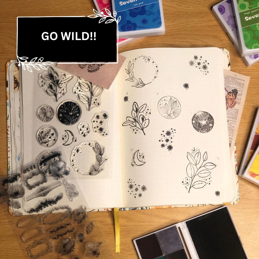 last step is to stamp in your Open notebook with any ink pad color of your choice, illustrations on a wooden surface with 'GO WILD!!' text overlay.