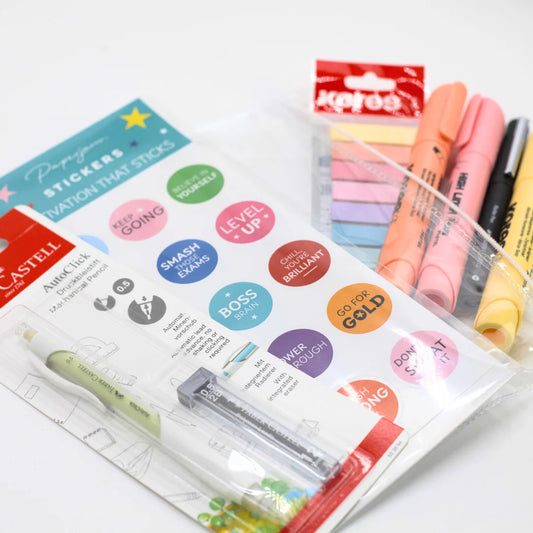 School Exam Stationery Kit Packaging of stationery items including stickers, markers, and a ruler on a white background