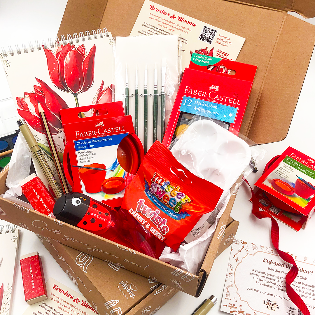 Brushes & Blooms gift Box that rocks of art supplies including Faber-Castell products on a white background