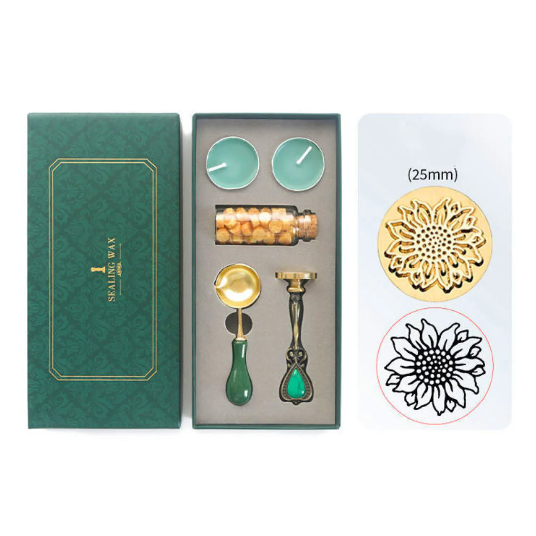 Sealing Wax Set of stamping tools including a stamp, ink pad, and ink stones in a green box.